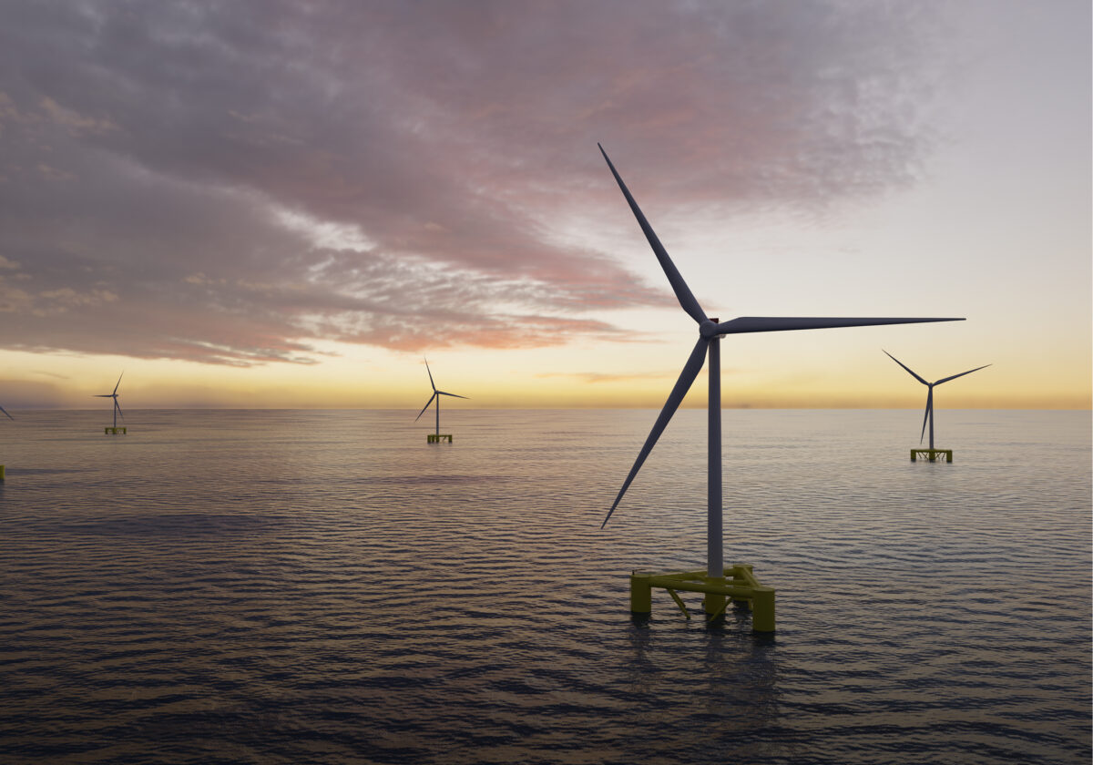 Offshore wind turbines in a calm sea with cloudy sky